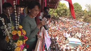 Suu Kyi promises Myanmar rights as she runs for parliament
