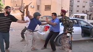 Rival militias exchange gunfire in central Tripoli