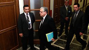 Greek cabinet backs fresh cuts ahead of MPs vote
