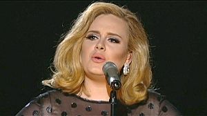 Adele sweeps Grammys but night belongs to Whitney