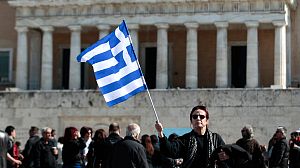 Austerity-hit Greeks scorn bailout deal