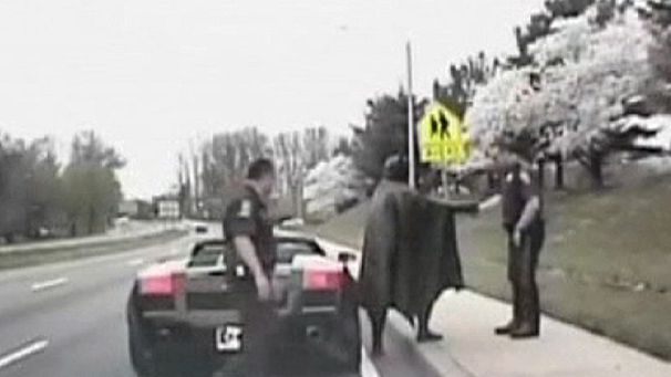 Batman stopped by the cops
