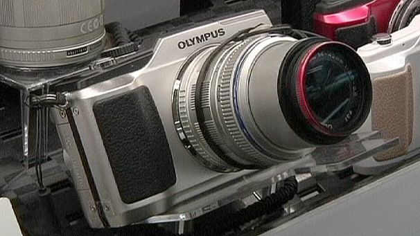Olympus hopes for fresh start, ex-CEO angry