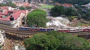 Police and protesters square up in Kuala Lumpur