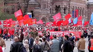 Putin leads workers’ rally through Moscow