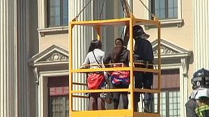 Japanese tourists stranded on Barcelona monument