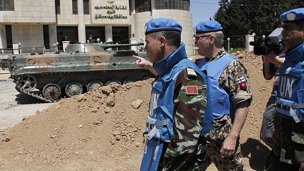 U.N. observers check Syrian heavy weaponry in field visit