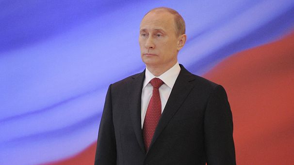 Putin back in as Russian growth falters