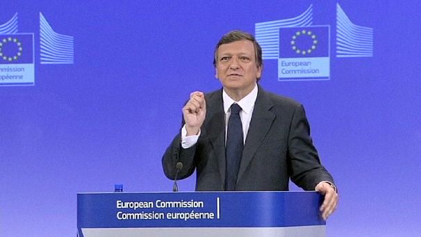 EU warns Greece to stick to austerity plan
