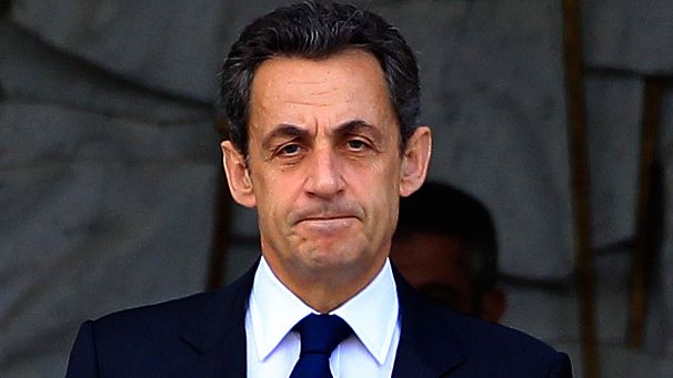 Sarkozy, how golden the handshake?