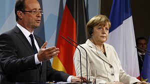Hollande and Merkel pledge joint eurozone proposals