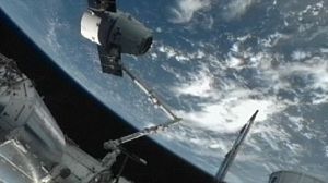 Commerical spacecraft docks at the ISS
