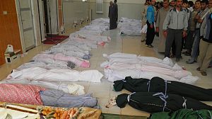 At least 90 dead after Syrian town attacked by government troops, activists claim