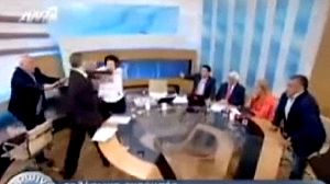 Greek Communist party deputy slapped on live TV