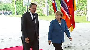 Cameron warns Merkel to take action on euro crisis
