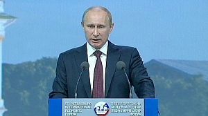 Putin promises economic reform and warns against civil disobedience