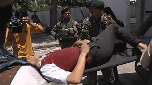 Dozens killed in Taliban attack on lakeside hotel