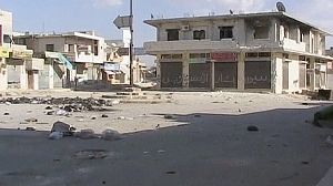 Syria uprising: Leaving ghost towns for refugee camps