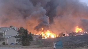 Caution after Colorado wildfire ‘mostly contained’