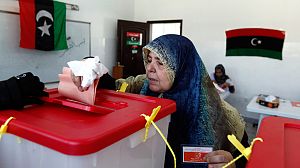 Polling station violence mars historic Libya election