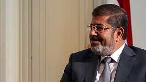 Egypt’s Morsi brings back parliament