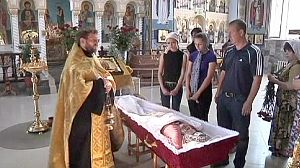 Clean-up and condolences after the Russia floods