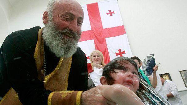 Mass baptism in Orthodox ceremony