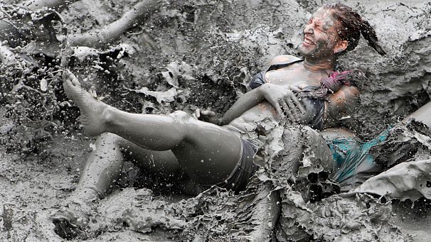 Getting dirty in South Korean mud festival