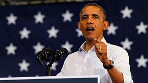 Obama steps up attacks on Romney