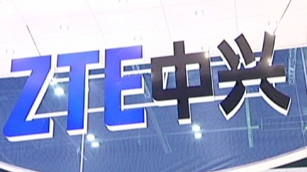 Profit warning and FBI probe hit ZTE