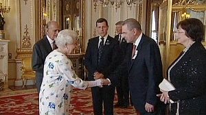 Queen Elizabeth hosts IOC members at Buckingham Palace