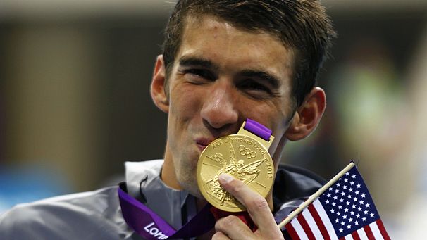 Phelps breaks medal record on day four of London 2012