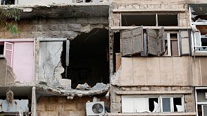 Iran offers “realistic” Syria summit