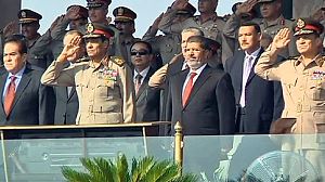 Egypt’s Morsi wields power against army top brass
