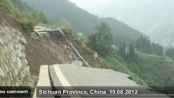 China: landslides trap thousands