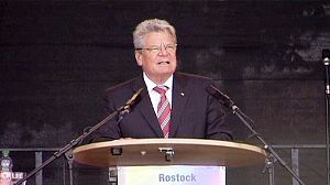 Germany ‘infected by xenophobia’ 20 years after racist mob attack