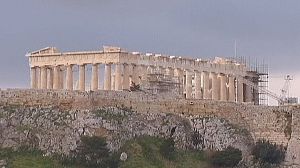 France backs Greek austerity delay – at a price