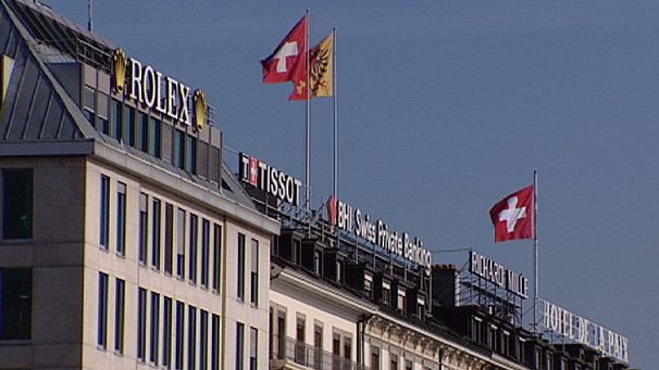 Swiss growth outlook cut