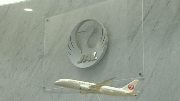 Ex-bankrupt Japan Airlines trades again