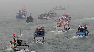 Japan protests after Chinese ships sail close to disputed islands