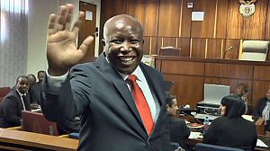 Critic of South African President charged
