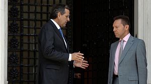 Greek government agrees new cuts programme