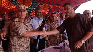 Libyans give up guns and explosives in state collection drives