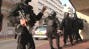 French police shoot man dead in anti-terror raids