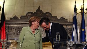 Merkel praises Greek reform and promises support