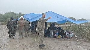 Syrian refugees flee Azmarin fighting