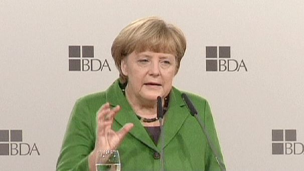 Merkel softens stance on eurozone strugglers