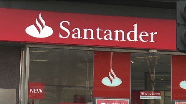 Santander profit plunges on property losses