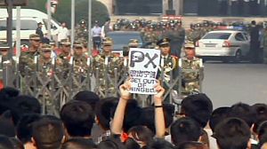 China: Halt to plant expansion doesn’t stop protests