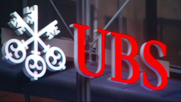 UBS slashes jobs, quits fixed income business
